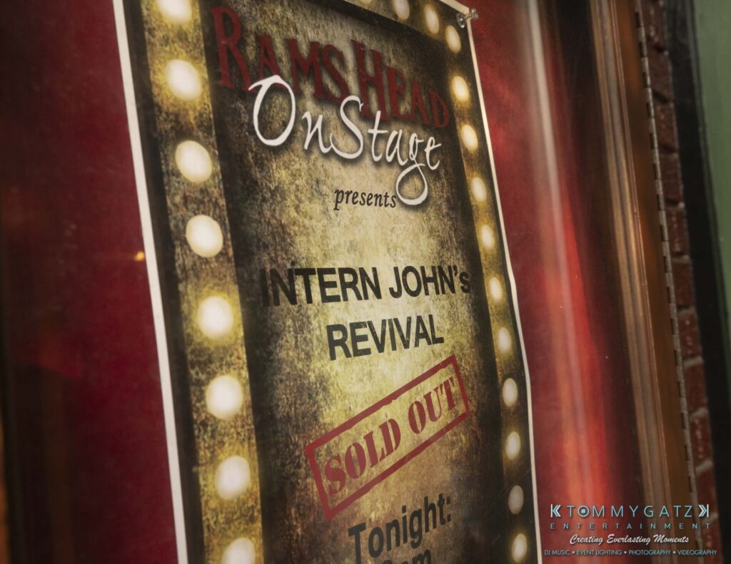 Close-up of a poster for "Intern John's Revival" at Rams Head OnStage, indicating the show is sold out.